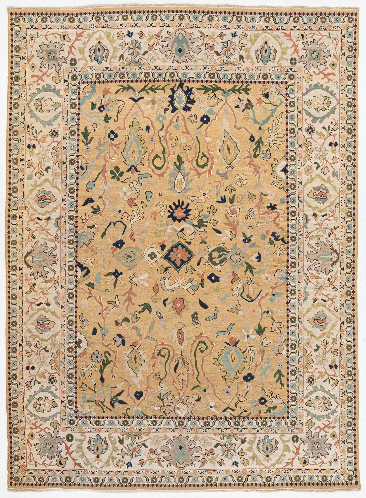 An Indian flat weave carpet of 'Shah Abbas' design, c. 402 x 289 cm.
