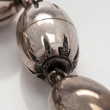 Kalevala Koru, a set of sterling silver "Halikko treasure" necklace, bracelet, ring and earrings. Helsinki 1994.