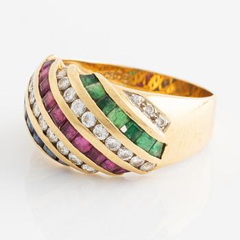 Ring, with brilliant-cut diamonds, emeralds, rubies, and sapphires.