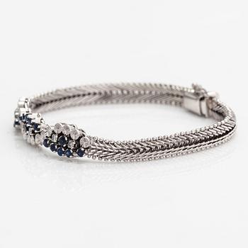 Rannekoru, 18K valkokultaa, safiireja ja timantteja n. 0.18 ct yht.