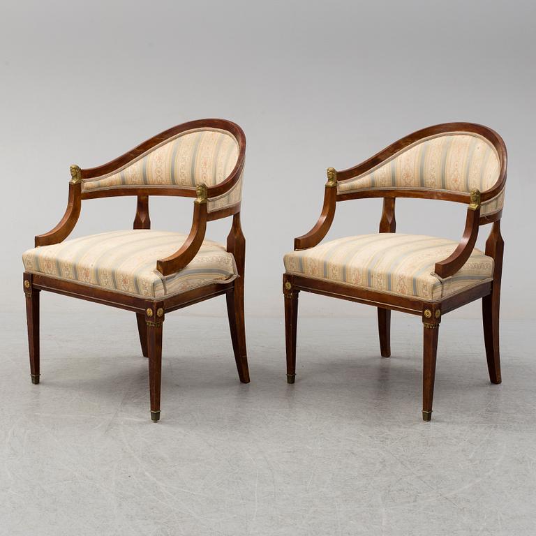 A pair of early 20th century late Gustavian style mahogany armchairs.