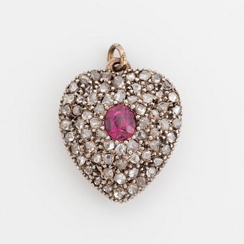 347. A heart locket in silver and gold set with a ruby and rose-cut diamonds.