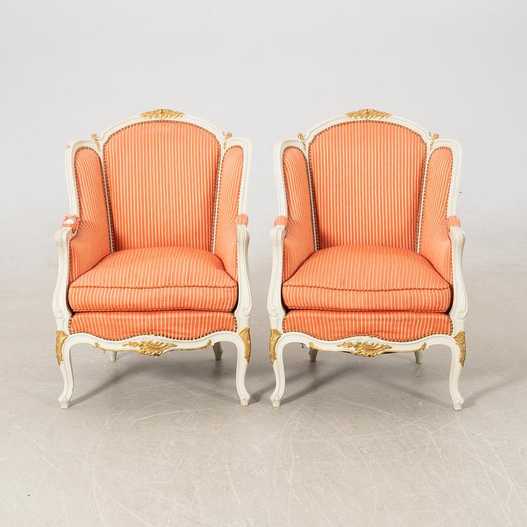 Bergèrer/fåtöljer ett par Rokoko-stil 1900-talets första hälft.