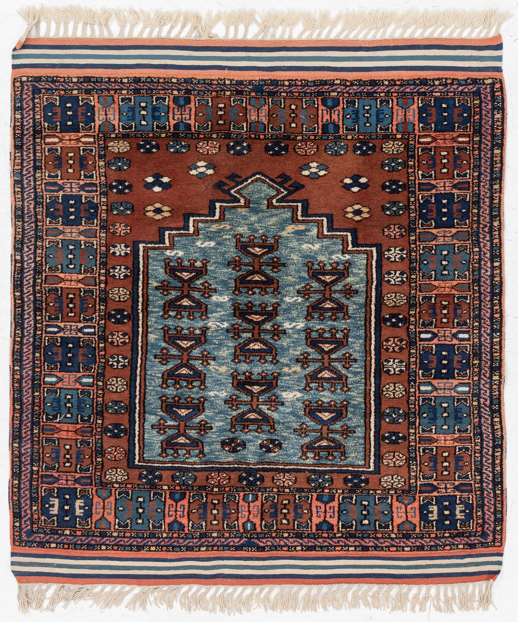 A semi-antique Anatolian rug, c. 127 x 117 cm.