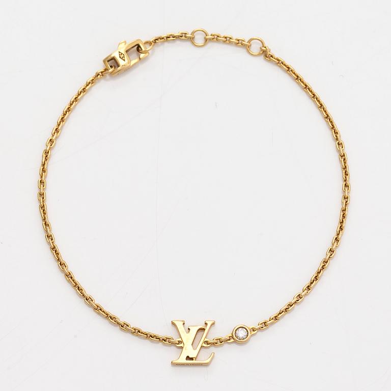 Louis Vuitton, an 18K gold 'Idylle Blossom LV' bracelet with a diamond.