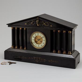 An end of the 19th century stone mantle clock.