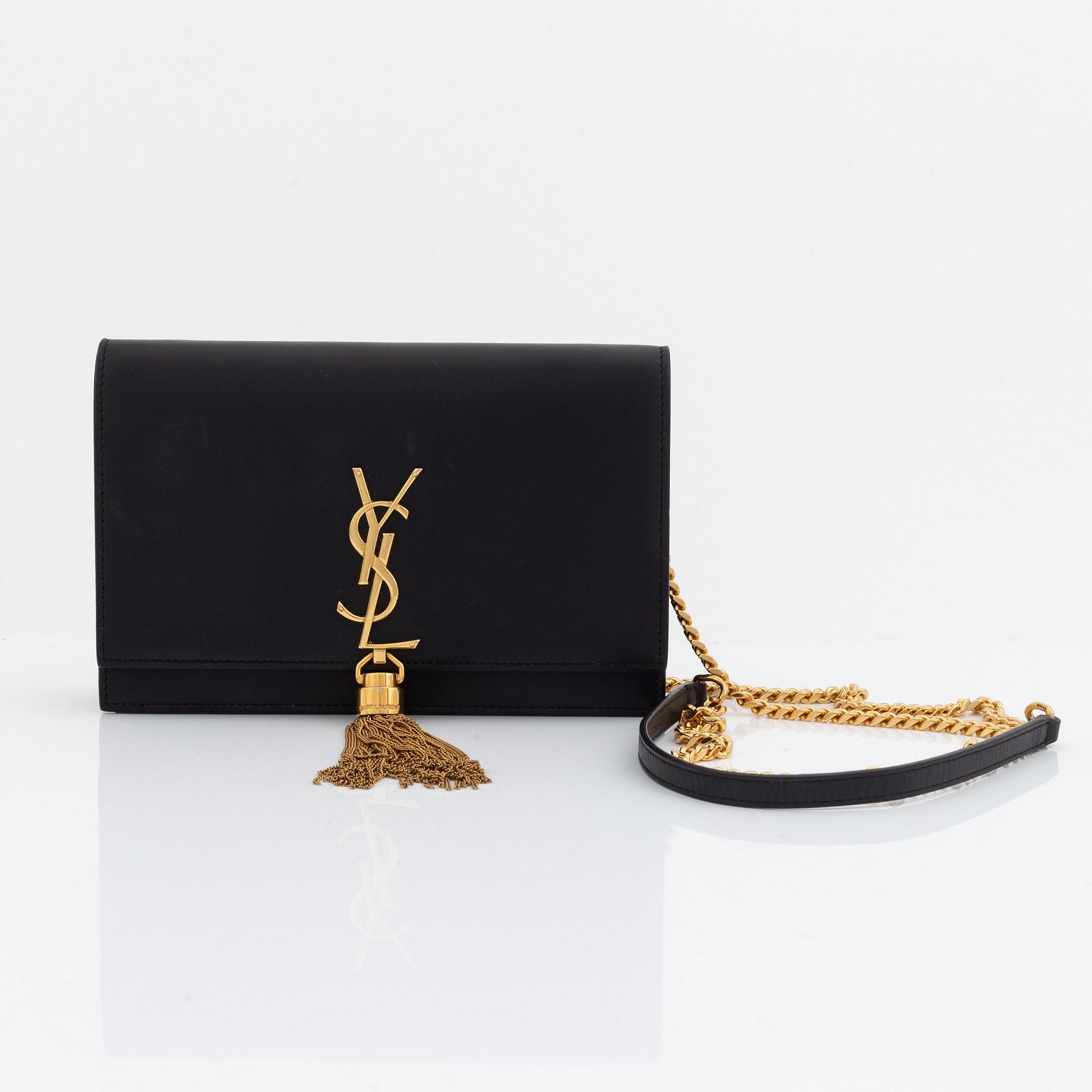Yves Saint Laurent, a black leather 'Kate Medium' clutch,.