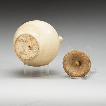 A cream glazed ewer with cover, Tang dynasty (618-907).