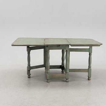 A painted pine gate-leg table, 19th Century.