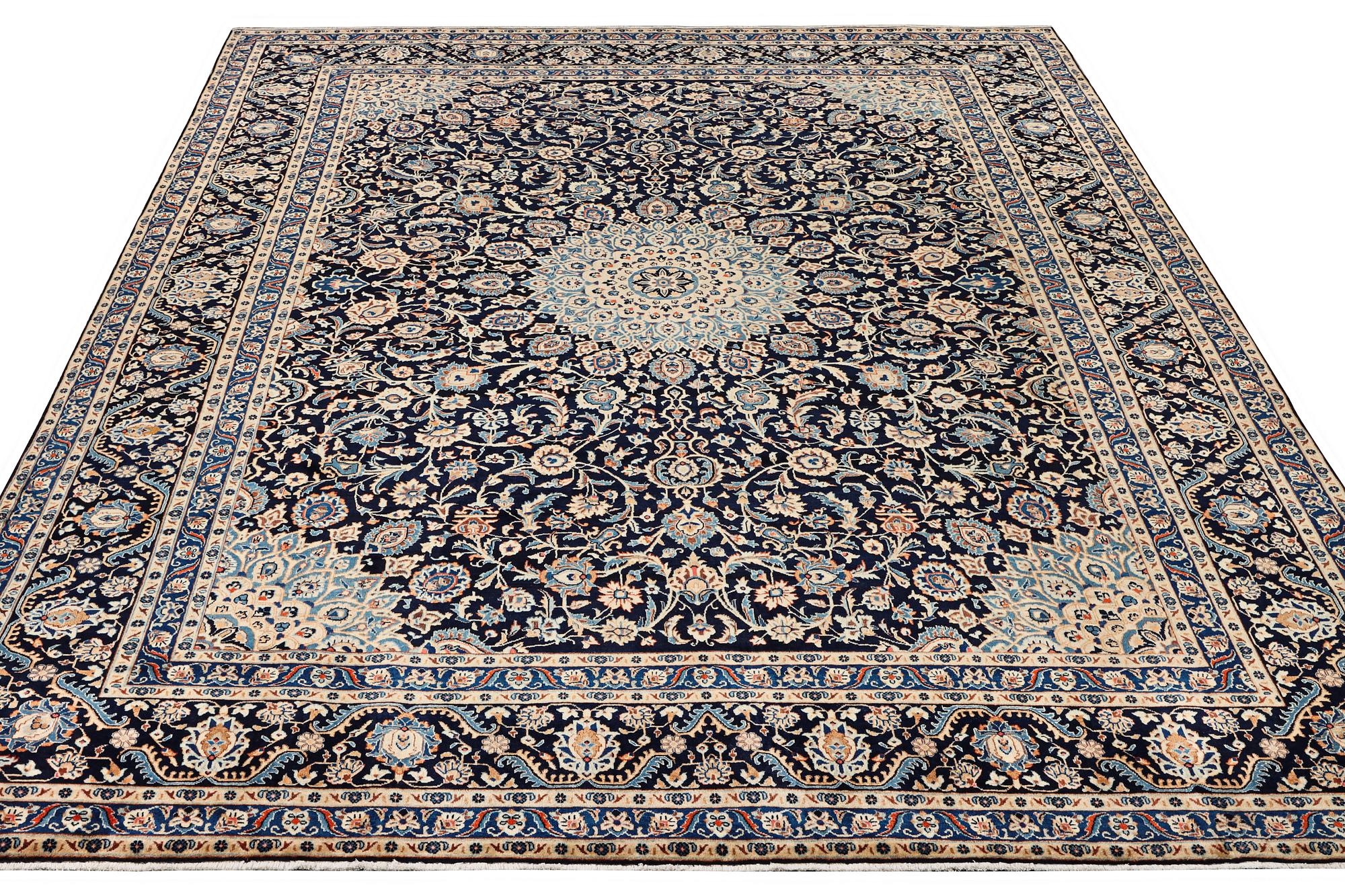 A Kashan carpet, c. 392 x 290 cm.