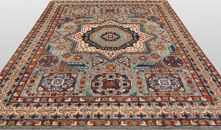 An Oriental carpet, c. 296 x 249 cm.