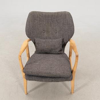 Armchair with armrests, modern manufacture.