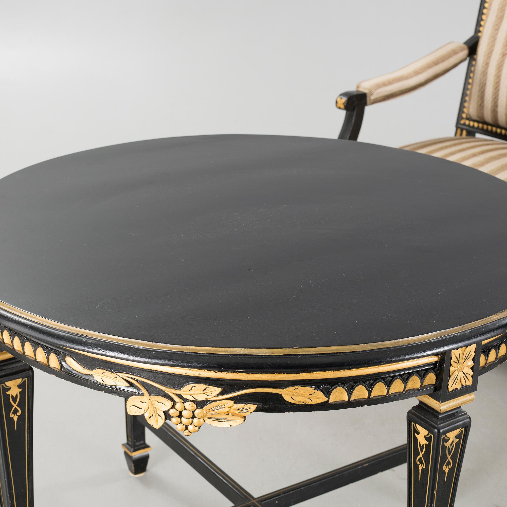 A gustavian style table and sofa, around the year 1900.