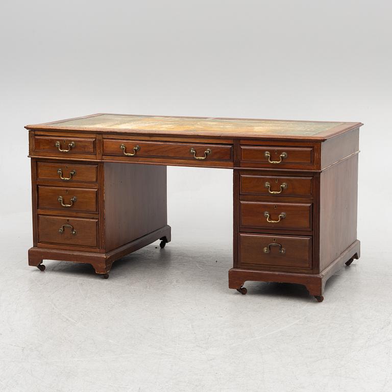 A 20th century writing desk, England.