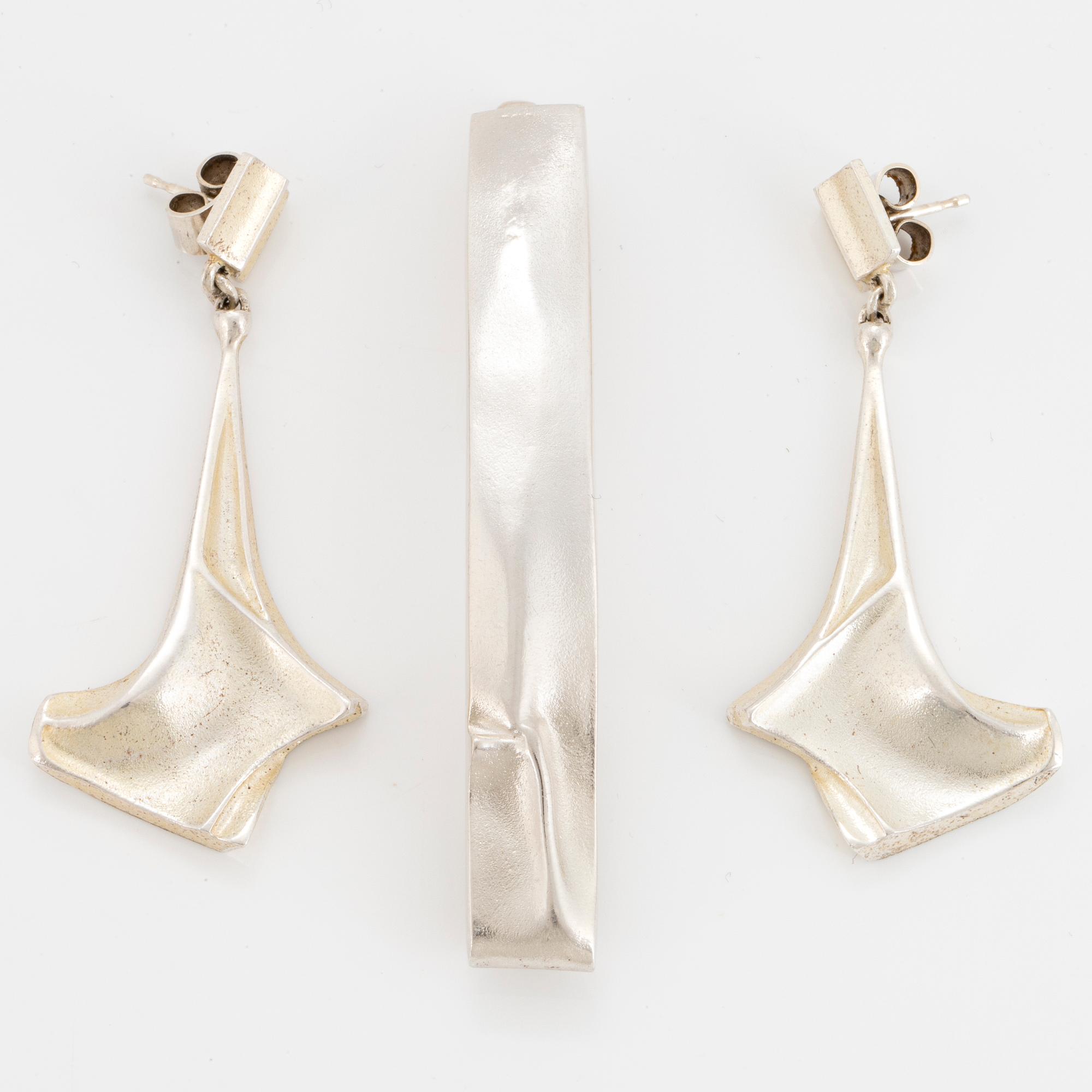 Earrings, silver, "Mini Punk" 1990, and tie clip, Björn Weckström, Lapponia.