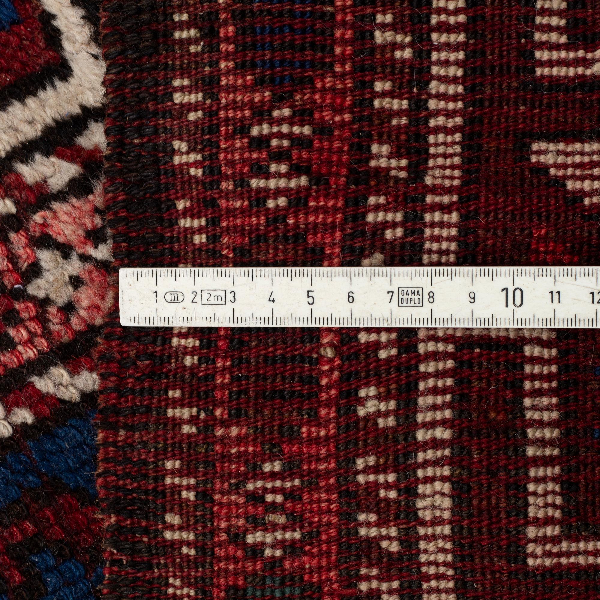AN ANTIQUE TURKISH RUG, probably Bergama, ca 256 x 183 cm.