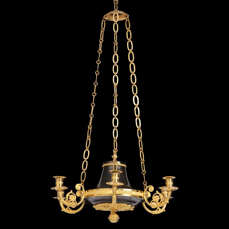 A Swedish Empire ormolu and patinated six-branch chandelier, Stockholm, early 19th century.