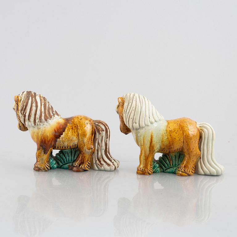 Gunnar Nylund, a pair of stoneware figurines, Rörstrand, Sweden, mid 20th century.