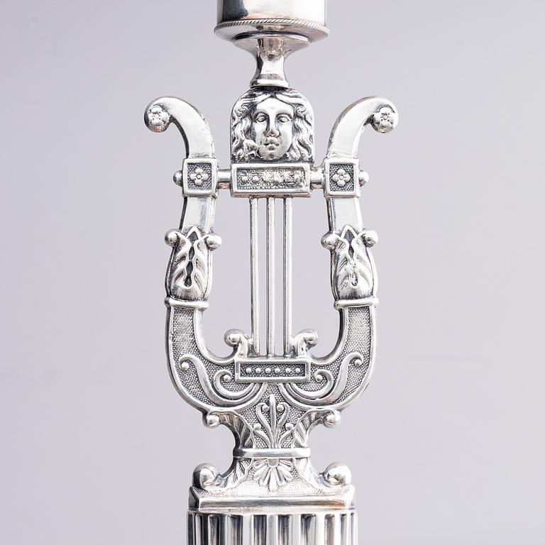 A pair of Swedish silver candlesticks, marks of Gustaf Folcker, Stockholm 1825.