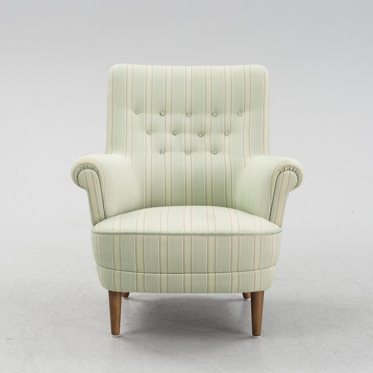 Carl Malmsten, a 'Hemmakväll' lounge chair from OH SJögren, later part of the 20th Century.