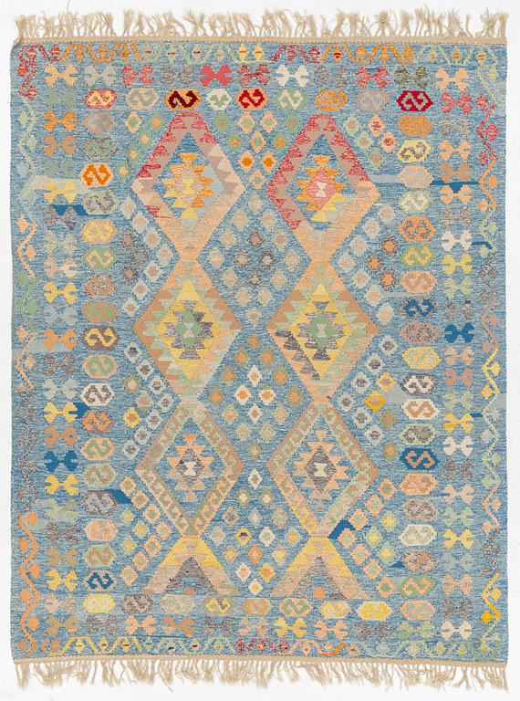 A Kilim rug, c. 255 x 202 cm.