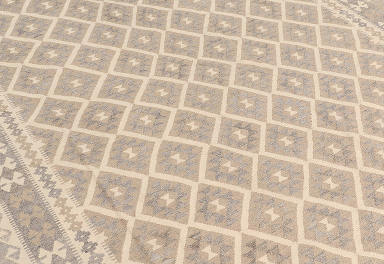 A carpet, Kilim, ca 295 x 211 cm.