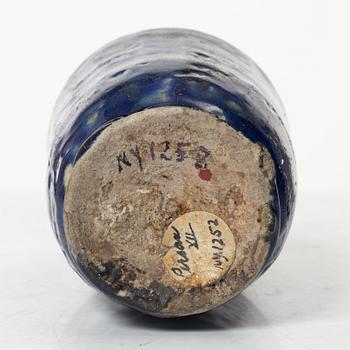 A Kashan pottery vase, central Persia 13th century.