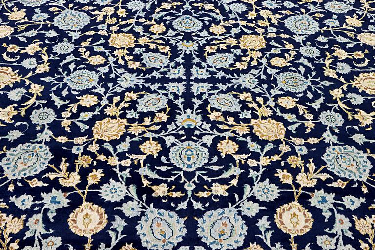A Kashan carpet, c. 395 x 305 cm.