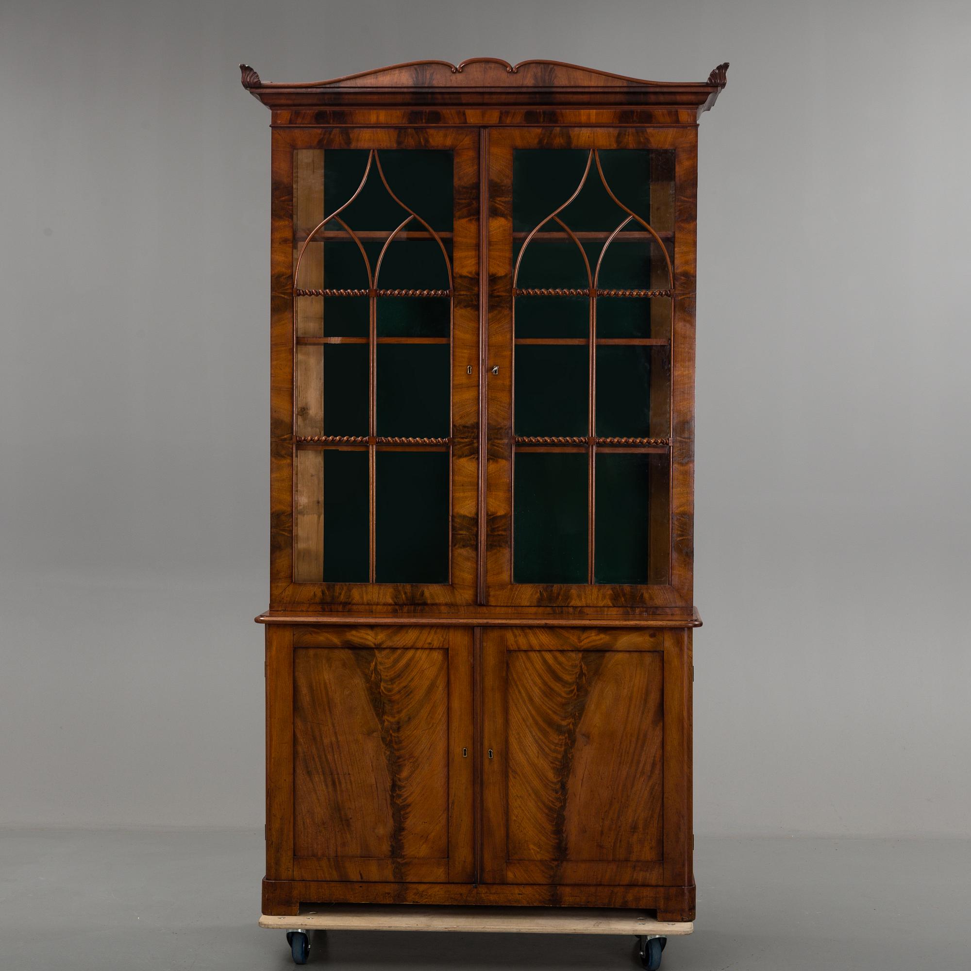 A SWEDISH BOOKCASE, first half of the 19th century.