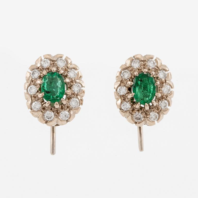 Earrings, carmosé. white gold with emeralds and brilliant-cut diamonds.