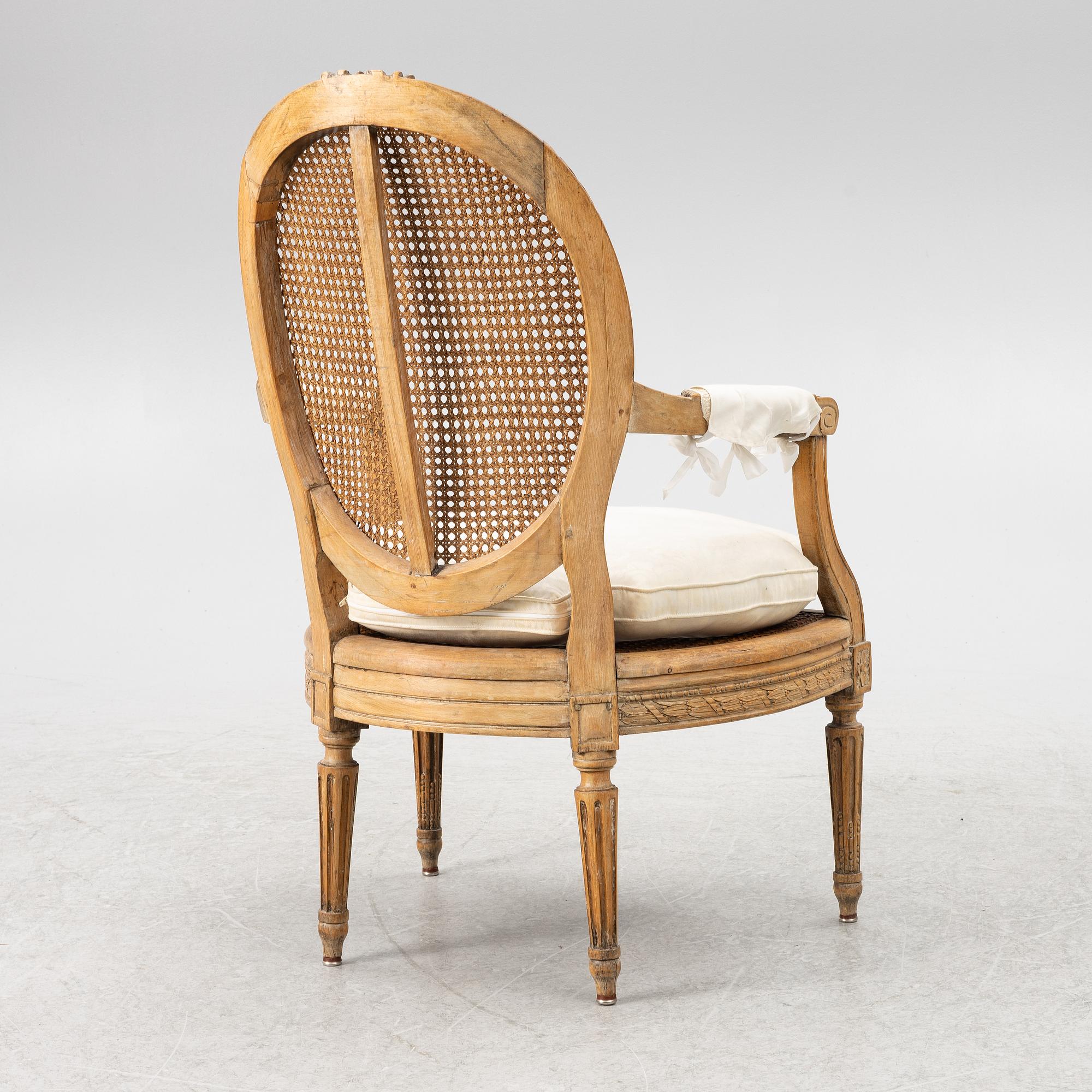 A Louis XVI-style armchair, 19th century.