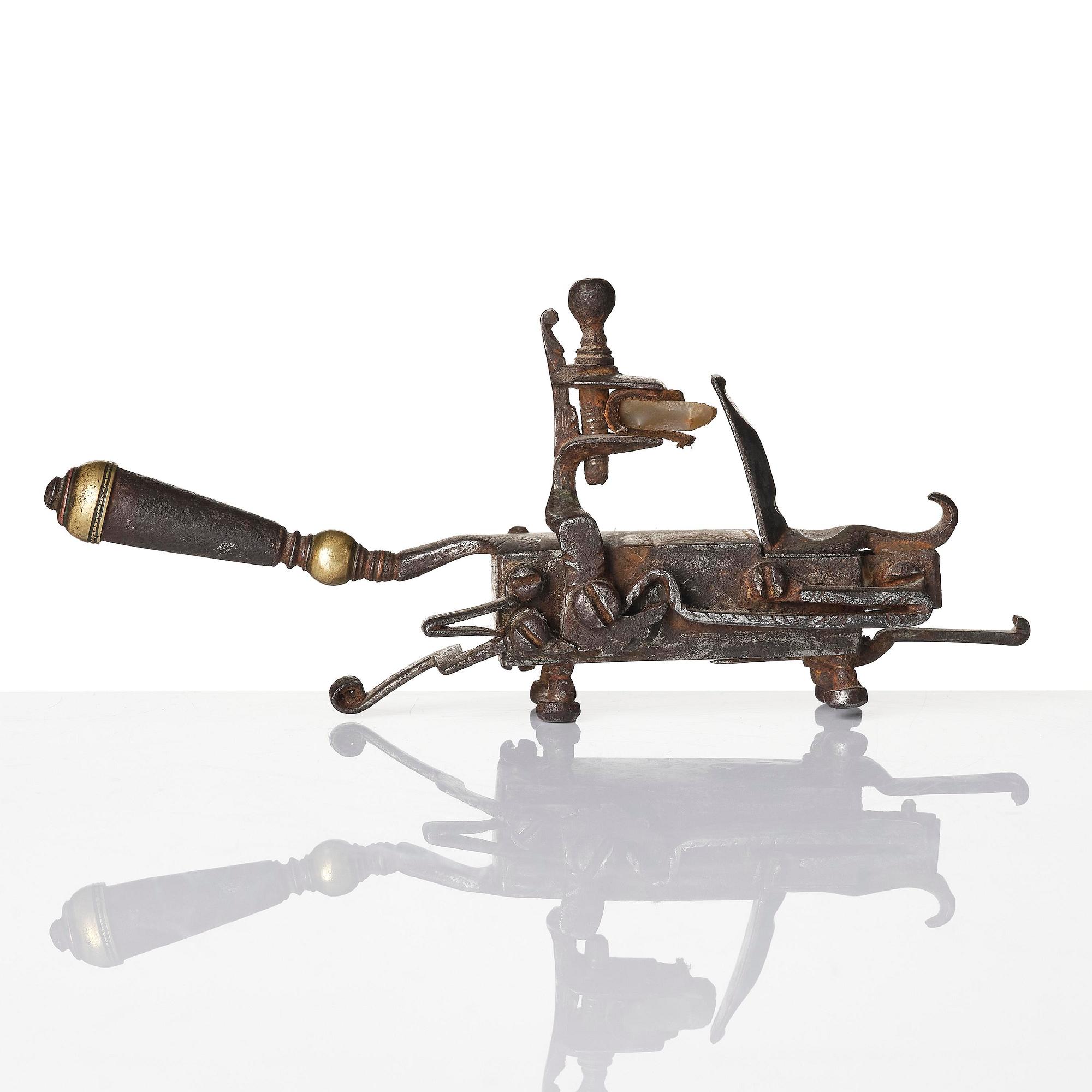 A mechanical flintlock igniter, later part 18th century/early19th century.
