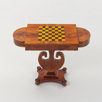 A Swedish Empire mahogany games' table attributed to J. Öman (master in Stockholm 1815-33).