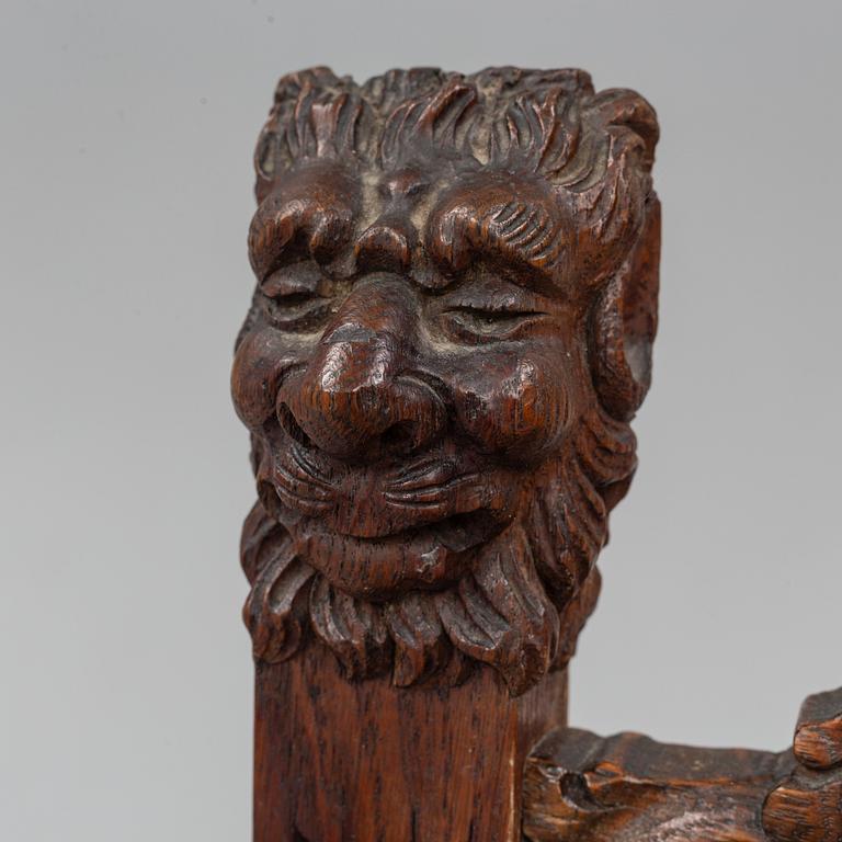 A Baroque style oak armchair, first half of the 20th Century.