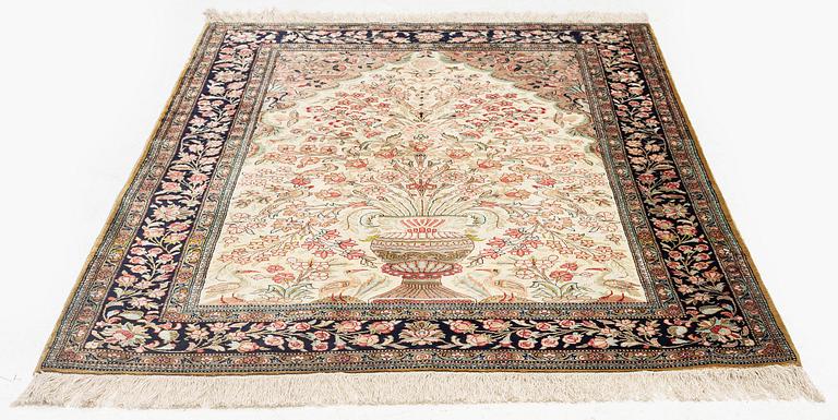 A silk Qum rug, c. 156 x 101 cm.