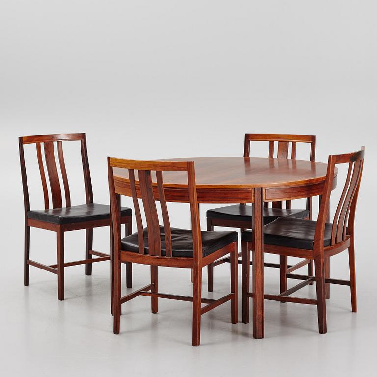 Bertil Fridhagen, a rosewood-veneered dining table with four chairs, BOdsfors, Sweden, 1960's.