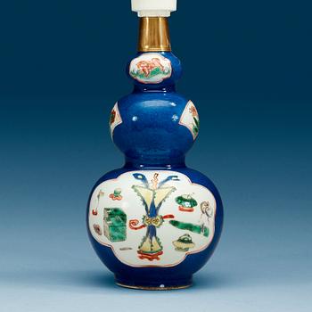 1792. A powder blue and famille verte kalebas vase, Qing dynasty 18th Century.