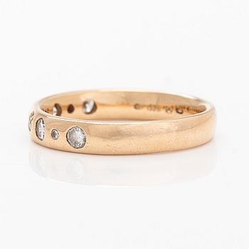 A 14K gold half eternity ring, set with brilliant-cut diamonds, total approximately 0.26 ct. Finnish import marks  1997.
