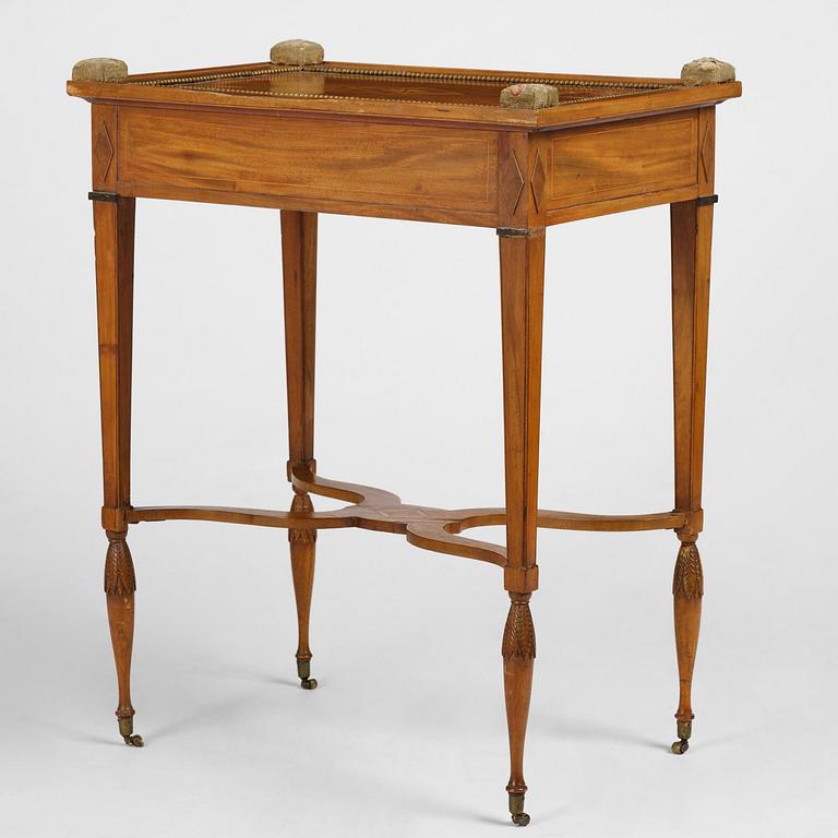 A late Gustavian mahogany table attributed to L. Qvarnberg (master in Stockholm 1801-13).