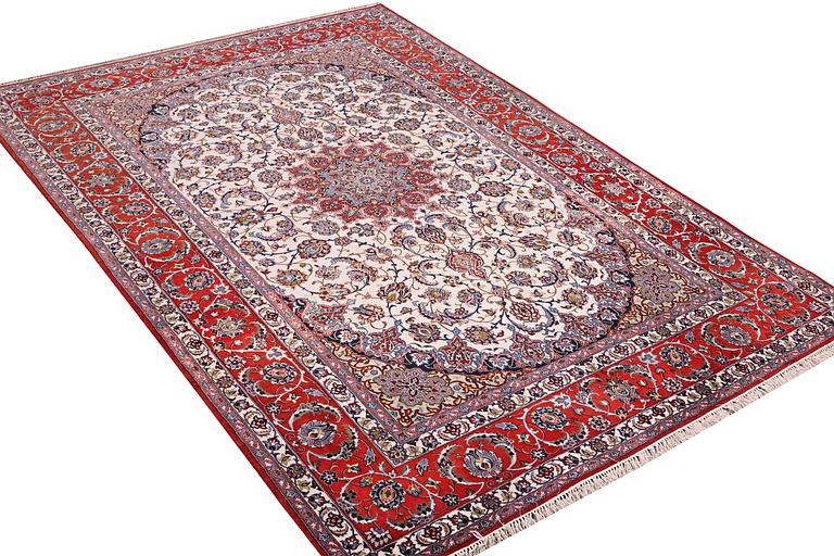A carpet, Esfahan, part silk, c. 317 x 202 cm.