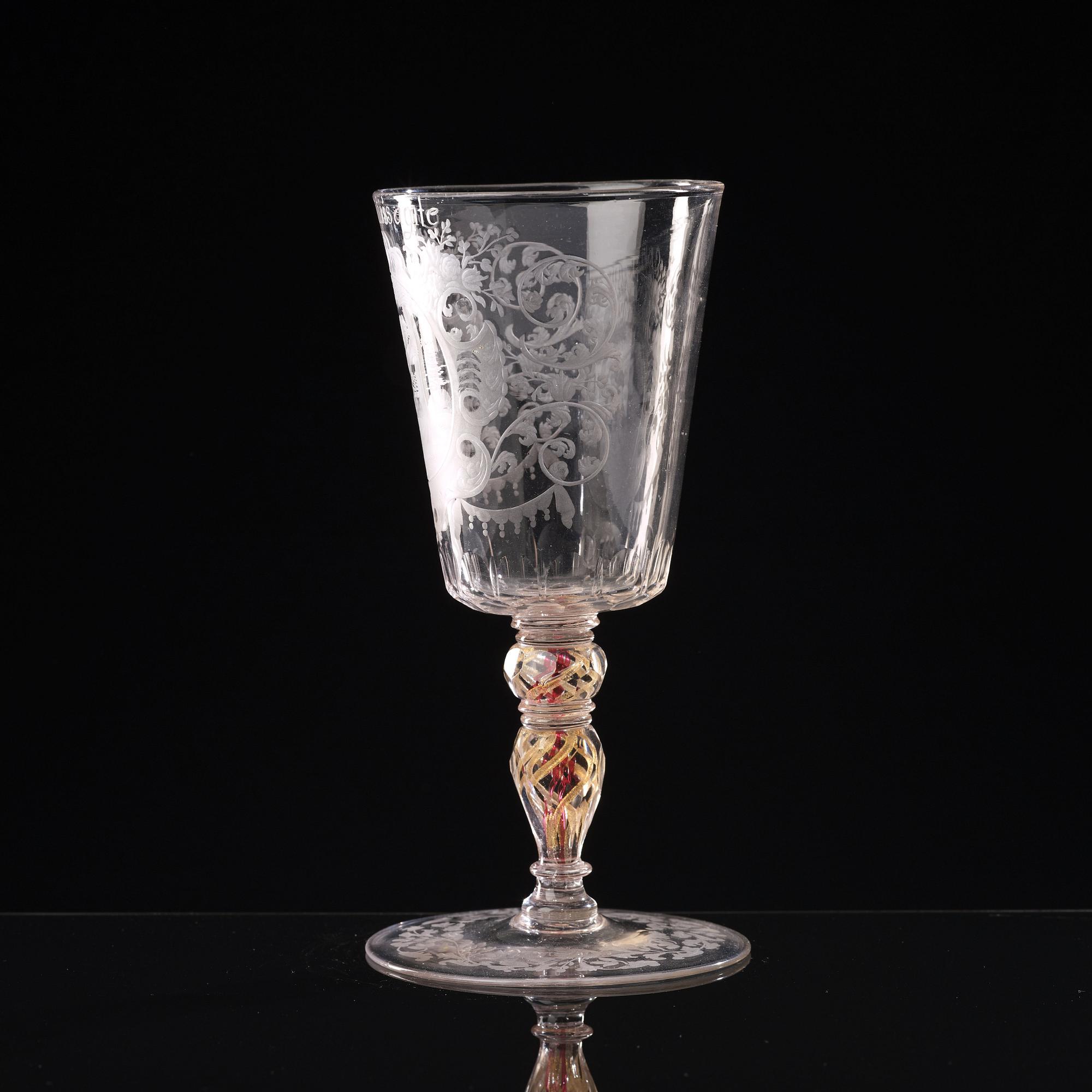 A Bohemian cut and engraved glass goblet, 18th Century.