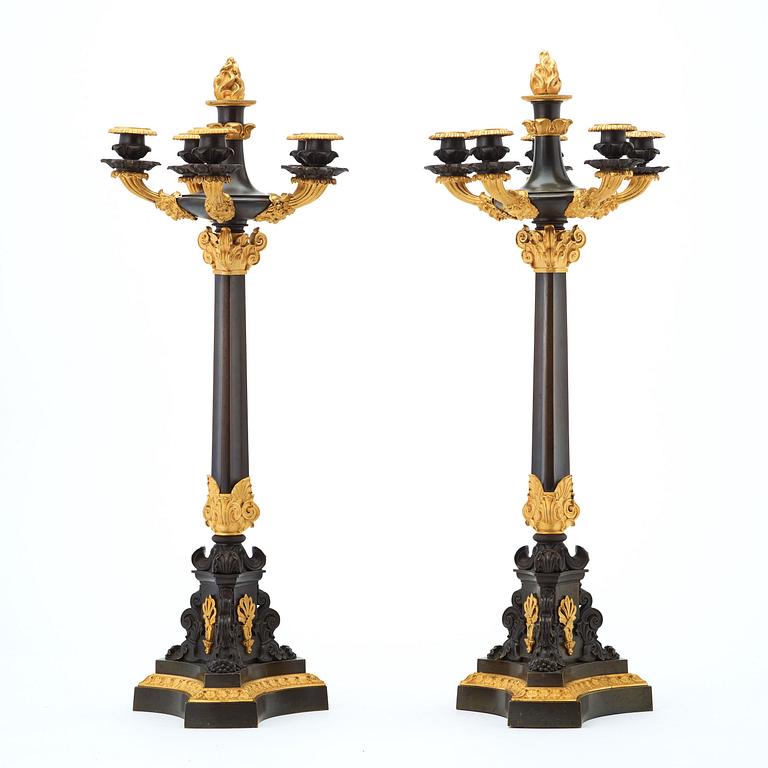 A pair of French 1830/1840's late Empire six-light candelabra.