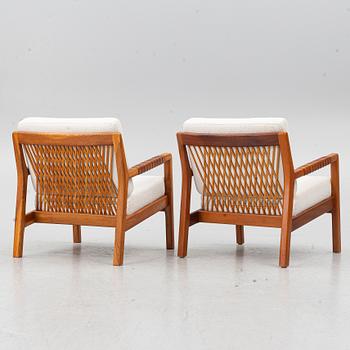 Carl Gustaf Hiort af Ornäs, a matched pair of 'Rialto' lounge chairs, Puunveisto Oy - Träsnideri Ab, Finland, mid-20th century.