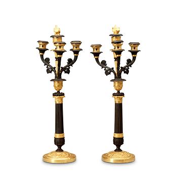 512. A pair of French Empire 19th century four-light candelabra.