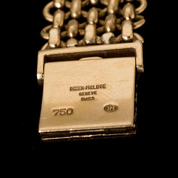 HERRARMBANDSUR, 18 k guld, "Golden Ellipse", Patek Philippe. Vikt ca 82 g.