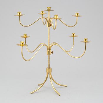 A BRASS CANDELABRUM, second half of the 20th century.