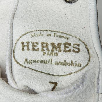 HANDSKAR, Hermès.