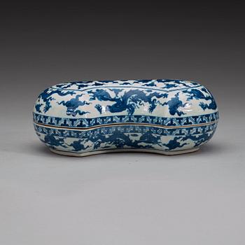 An ingot-shaped blue and white box with cover, Wanli six-character mark, Republic (1912-1949).