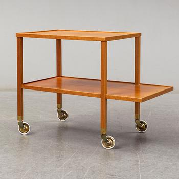 JOSEF FRANK, a model 470 walnut tea trolley for Svenskt Tenn, Sweden.