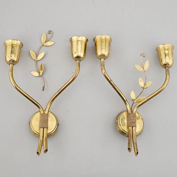 A late 20th Century brass wall scones.